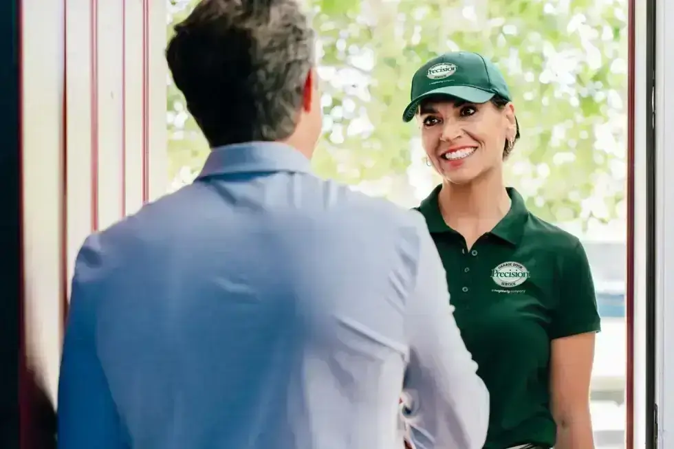 Customer greeting a representative from Precision Garage Door